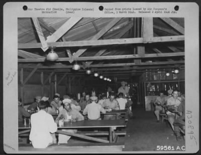 Consolidated > Mess Hall of Company C, 863rd Engineer Aviation Battalion at Manila, Philippine Islands, 17 April 1945.