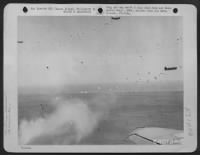 THE STRIKE AT APPARI--Here is the attack that won for U.S. forces the vital Appari Airstrip in Northern Luzon, Philippine Islands. Dropping out of the planes are members of the 11th Airborne Division to start the attack to bring the airstrip into - Page 1