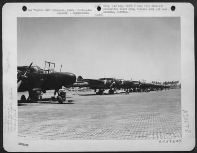 Consolidated > Mechanics Of The 547Th Night Fighter Squadron On Lingayen Airstrip Service And Check Their Airplanes.  Night Flying Requires Plane Crew Members To Sleep In The Day Time While Crew Chiefs Service And Check Planes During The Day, Assuring The Readiness Of T