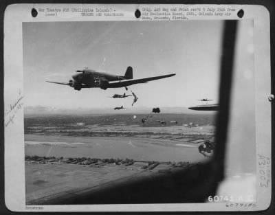 Thumbnail for Consolidated > The Rate Of Casualities Were Low As Paratroopers Jumped From C-47 Over The Camalaniugan Air Strip, Luzon, In The Philippine Islands.  One Person Was Killed When His Chute Failed To Open; And 56 Others Were Injured.  This Particular Plane Was In The Second