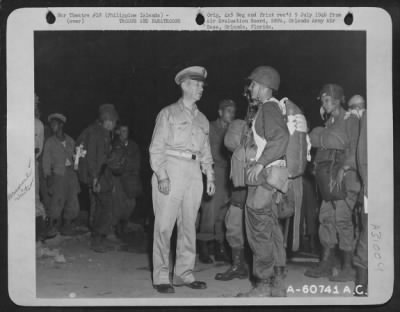 Consolidated > General Kruger Discussing Plans For A Paratroop Drop With Officers Of The 11Th Airborne Division, 511Th Parachute Infantry Regiment.  4:30Am, 23 June At Lipa Airstrip, Luzon, In The Philippine Islands.