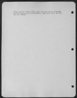 Thumbnail for Consolidated > Using a box for a table, S/Sgt. Baker took time out for lunch when the 57th Fighter Group in Tripolitania, Libya moved into a new airbase near Tripoli.