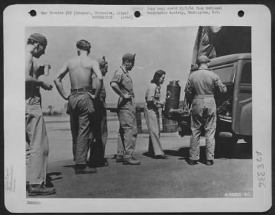 Thumbnail for Consolidated > When a Red Cross clubmobile rolls into a hangar, ground crew as well as flyers line up. Carrying home-town newspapers, magazines, and games, as well as refreshments, clubmobiles now serve armed forces on every front. In Iran, Red Cross workers