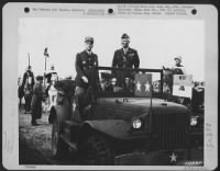 Major General Patton and French Gen. Nogues reviewing American and French troops during combined parade in Rabat, Morocco. - Page 1