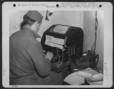 Consolidated > Bertreaux, Morocco-Aviation Signal Teletype Operator, Pvt. Rudolph Houston, Durant, Okla., sending a message to a fighter group from a U.S. Bomber Headquarters somewhere in Morocco.