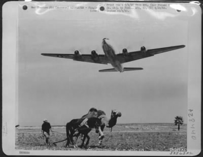 Consolidated > Morocco - The First "Skyrocket" Takes Off Over An Arab Farm Of French Morocco On The Inaugural 4,800 Mile Run. A Dawn-To-Dawn Flight Will Put The Four Engined Douglas C-54 In Karachi, India, Complete With A Payload Of 10,800 Pounds In Less Than 25 Hours O