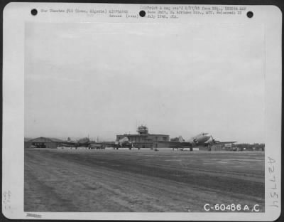 Consolidated > Curtiss C-46's and Douglas C-47's at ATC base, Oran, Algeria.