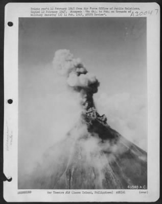 Consolidated > MAYON VOLCANO ERUPTS. This series of photographs, taken from a Douglas C-47 Skymaster of the Army Air Forces' 15th Weather Squadron in the Philippines, graphically depicts the recent eruption of Mount Mayon on Luzon Island, of the Philippines.