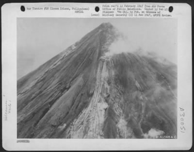 Consolidated > MAYON VOLCANO ERUPTS. This series of photographs, taken from a Douglas C-47 of the Army Air Forces' 15th Weather Squadron in the Philippines, graphically depicts the recent eruption of Mount Mayon on Luzon Island, of the Philippines.