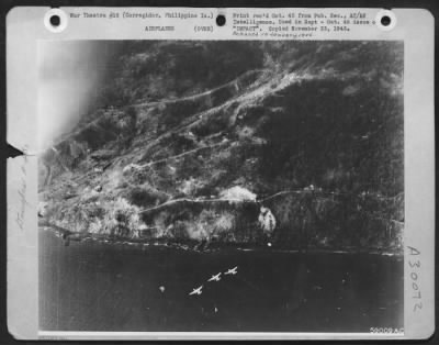 Consolidated > Douglas A-20's head for targets on Corregidor while the invasion is under way. These planes later worked "on call" from ground troops.