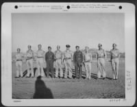 At an advance B-25 base in North Africa on 27 June 1943, a formation of more than 1200 officers and men watched the awarding of eight Purple Hearts and two Soldier's Medals. Left to right are those who received Purple Hearts; S/Sgt. Francis E. - Page 1