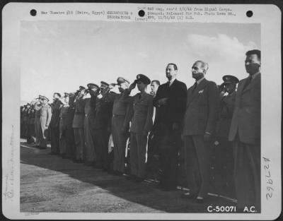 Consolidated > Cairo, Egypt-The playing of the American National Anthem brought attention and salutes from dignitaries with King Peter of Yugoslavia at the Liberator presentation ceremonies.