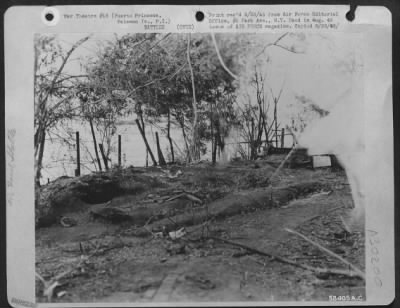 Consolidated > FUNERAL PYRE--This was an air raid shelter which the Japanese permitted American prisoners of war to construct for their own use. A few weeks before our forces invaded Palawan, the Japs sounded a fake alert and then after the prisoners had taken