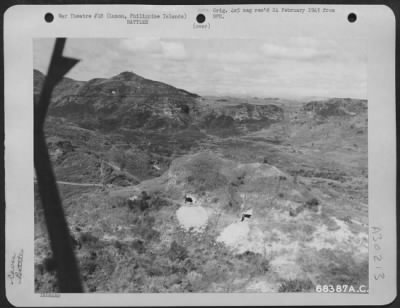Consolidated > The Japanese were firmly entrenched in caves in the hillsides surrounding Clark Field on Luzon, Philippine Islands. They had an ample supply of guns and ammunition. In order to clear out the area, foot soldiers had to climb up the steep slopes in the