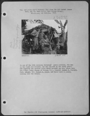 Consolidated > In one of the 11th Airborne Division's patrol actions, the man on the right was wounded. Our men cleaned up the enemy patrol and captured the machine rifle which wounded the man, shown here are S/Sgt. Peter Stasso of Corona, N.Y., General Joseph