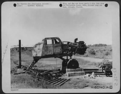 Consolidated > The Japanese version of an engine test block, with instruments located inside the cab. Normally, the "block" is portable; however, this particular one was anchored in cement. Grace Park Field, Philippine Islands-February 1945.