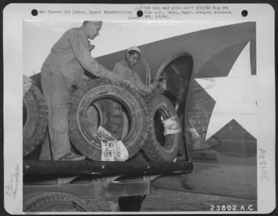 Thumbnail for Consolidated > Cairo, Egypt-Tires being loaded aboard U.S. Army Transport to be rushed to our fighting forces in the desert of the Middle East.