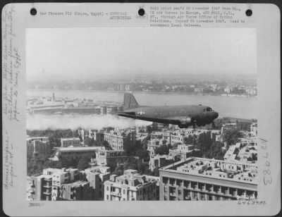 Consolidated > Cairo, Egypt - A Specially Eqiupped U.S. Force C-47, One Of Two Rushed Here To Help Combat The Cholera Epidemic, Is Shown Spraying Liquid Ddt-Solution At A Low Level In The Cairo Area.  Daily Aerial Sprayings Of Epidemic Infested Areas By The Two Air Forc