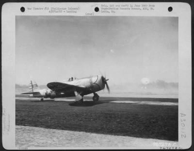 Consolidated > The Republic P-47 'Princess Margie' Rolls Down The Runway After Landing On Malgandan Strip Somewhere In Ther Philippine Islands.  This Plane Was The Second P-47 To Land On The Strip.