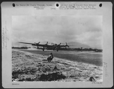 Consolidated > Liberator'S Arrival - A B-24 Of The Jungle Air Force Lands On Newly Repaired Puerto Princesa Airstrip.  The Appearance Of Heavies On Palawan Forshadowed Troublous Days For Japs In The Southern Regions Of Indo-China, Borneo And Malaya.