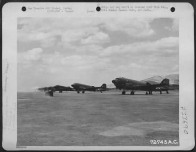 Thumbnail for Consolidated > Douglas C-47's of the 1st Air Commando Group lined up ready for take off from Palel, India, to transfer Indian and English troops into the invasion of Meiktila, Burma. 17 March 1945.