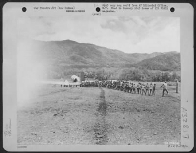 Thumbnail for Consolidated > During the construction of Eunice Airstrip in New Guinea, native labor was recruited to help build the strip. The natives were small of stature, but when enough of them pulled together they were usually able to accomplish tasks given to them.