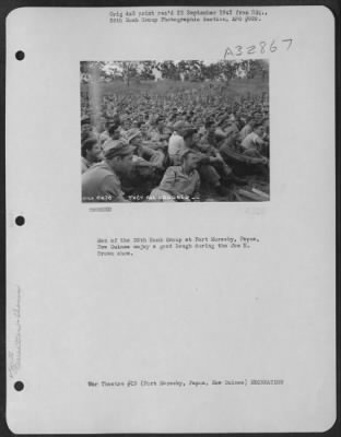 Thumbnail for Consolidated > Men of the 38th Bomb Group at Port Moresby, Papua, New Guinea enjoy a good laugh during the Joe E. Brown show.