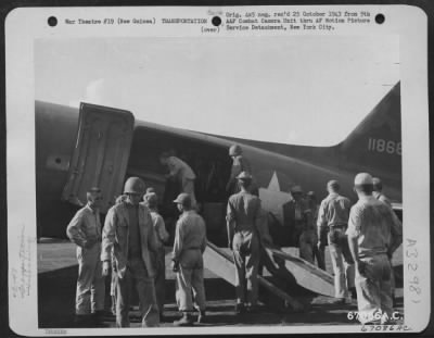 Thumbnail for Consolidated > Men unload supplies from a Douglas C-47 which landed at Nadzab Airstrip in New Guinea on 11 September 1943.