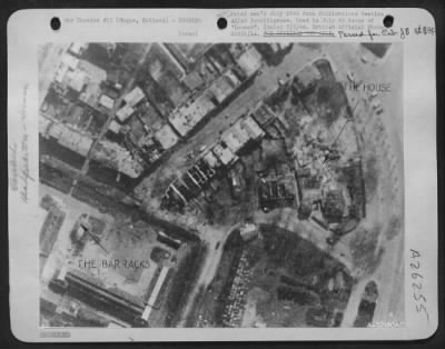 Consolidated > After bombing of a building housing secret documents near the junction of Scheveningsche Weg and Carnegie Plain in The Hague, Holland. Heap of rubble shows where target was. One bomb overshot the target, but even it was not wasted. It landed in a