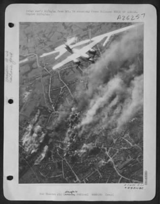 Consolidated > A Martin B-26 Marauder of the U.S. army 9th Air Force flies over the important Hengelo railroad yard, 40 miles northeast of Arnhem, in Holland, during a heavy attack by Ninth Bombardment Division Marauder medium bombers. The bombing of the yard, busy