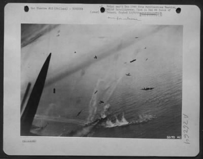 Consolidated > Beaufighters strafe enemy "M" Class minesweepers in North Sea off Holland on 25 Aug 44. Twelve airplanes can be counted in the melee. Object that appears to right of photo plane's vertical fin is a barrage balloon.