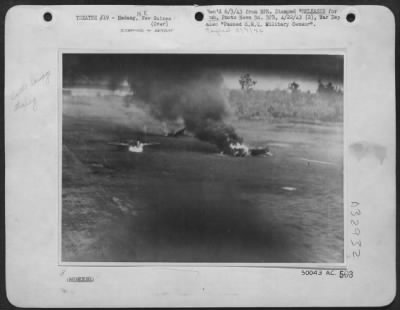 Consolidated > Japanese aircraft blazing on Madang airdrome during Friday's, April 9, 1943, combined strafing attack by American Mitchells and RAAF Beaufighters. This remarkable picture was taken from a Beaufighter attacking at ground level. Movement in the picture