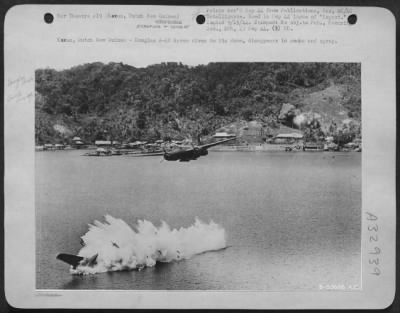 Consolidated > Karas, Dutch New Guinea-Douglas A-20 Havoc dives to its doom, disappears in smoke and spray.