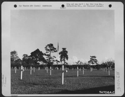Consolidated > Graves in the Panatola American Military cemetery somewhere in India. 11 June 1945.
