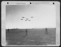 A formation of Martin B-26s of the 34th Bomb Squadron, 17th Bomb Group, take off from their Mediterranean base en route to bomb enemy targets. - Page 1