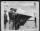 The Presidential Unit Citation is pinned on the unit flag of the 17th Bomb Group during a ceremony at an airfield somewhere in the Mediterranean Area. - Page 1