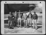 Thumbnail for The crew of the Martin B-26 "Ole Seven 5 Seven" of the 34th Bomb Squadron, 17 Bomb Group pose beside their plane at an airfield somewhere in the Mediterranean Area. - Page 1