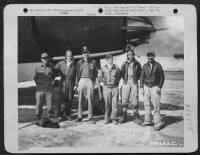 The crew of the Martin B-26 "Ole Seven 5 Seven" of the 34th Bomb Squadron, 17 Bomb Group pose beside their plane at an airfield somewhere in the Mediterranean Area. - Page 1