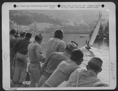 Consolidated > The Rest Campers, refreshed after their 7 day vacation, hate to leave. It's back to the flight and the fight now but they look wistfully back at Capri as the boat pulls out.