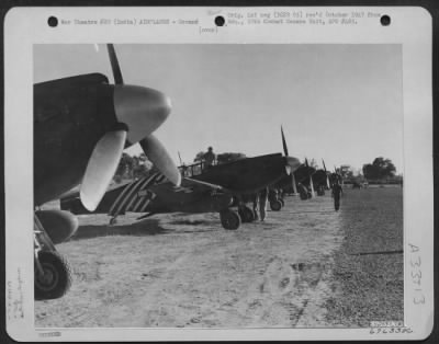 Consolidated > Assembled North American P-51 "Mustangs", Designated For The 1St Air Commando Force, Are Lined Up At A Field Near Karachi, India, Prior To Taking Off For A Forward Airstrip Near Burma.