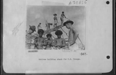 Thumbnail for Consolidated > Natives Building Shack For U.S. Troop.