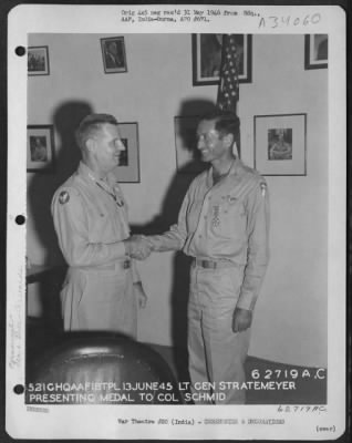 Consolidated > Lt. General George E. Stratemeyer Congratulates Colonel Schmid After Presenting Him With The Legion Of Merit At An Airbase In India On 13 June 1945.