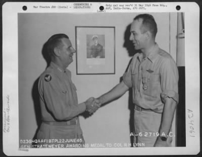 Consolidated > Lt. General George E. Stratemeyer Congratulates Colonel R.H. Lynn After Presenting Him With The Legion Of Merit At An Airbase In India On 22 June 1945.