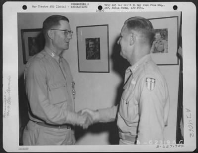 Consolidated > Lt. General George E. Stratemeyer Congratulates Colonel Williams After Presenting Him With The Legion Of Merit At An Airbase In India On 5 July 1945.