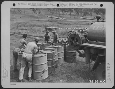 Thumbnail for Consolidated > Members Of 64Th Bomb Squadron Fill Tank Trailers With High Octane Gas At Morris Dump, Ward'S Drome Near Port Moresby, New Guinea.  April 1943.