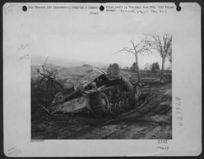 Consolidated > A Battered Mark Iv Tank With Mounted Self-Propelled Gun Knocked Out By Xix Tac Fighter-Bombers, West Of The Our River Near Dasburg In Northern Luxembourg. This Tank Was Among The Large Number Of German Vehicles, Tanks, And Guns, Destroyed By Fighter-Bombe