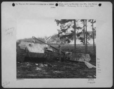 Consolidated > A Decapitated Mark V Panther Tank, Knocked Out By Xix Tactical Air Command Fighter-Bomber In The Mass Destruction Of German Equipment During Thier Mass Withdrawal Eastward In Northern Luxenburg Jan 22-25, 1945. This Tank Was Blasted Out Of The Was Near Ma