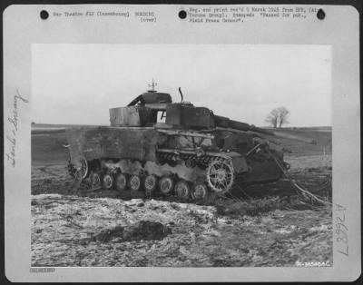 Consolidated > Ninth Air Force Bombing Of The Area In The Luxembourg Sector Knocked Out This German Panther [Panzerkampfwagen Iv] Tank As The Enemy Was Forced Back To The Siegfried Defenses And Toward The Rhine.