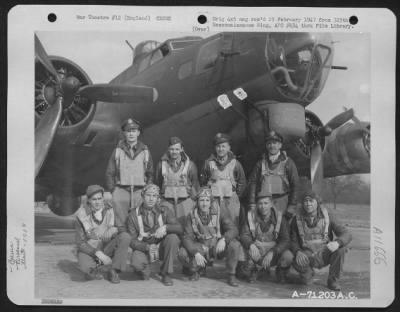 General > Lt. Hawg And Crew Of The Boeing B-17 "Flying Fortress" Of The 390Th Bomb Group Pose By Their Plane At Their Base In England On 19 March 1944.