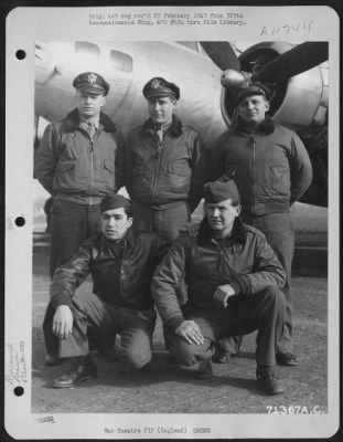 General > Lt. Hassig And Crew Pose Beside A Boeing B-17 "Flying Fortress" Of The 390Th Bomb Group At An 8Th Air Force Base In England.  25 February 1945.